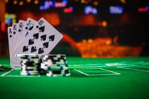 quizizi Casino Hold'em live dealer table with community cards and player interface